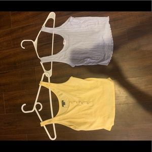 two medium sized tank tops